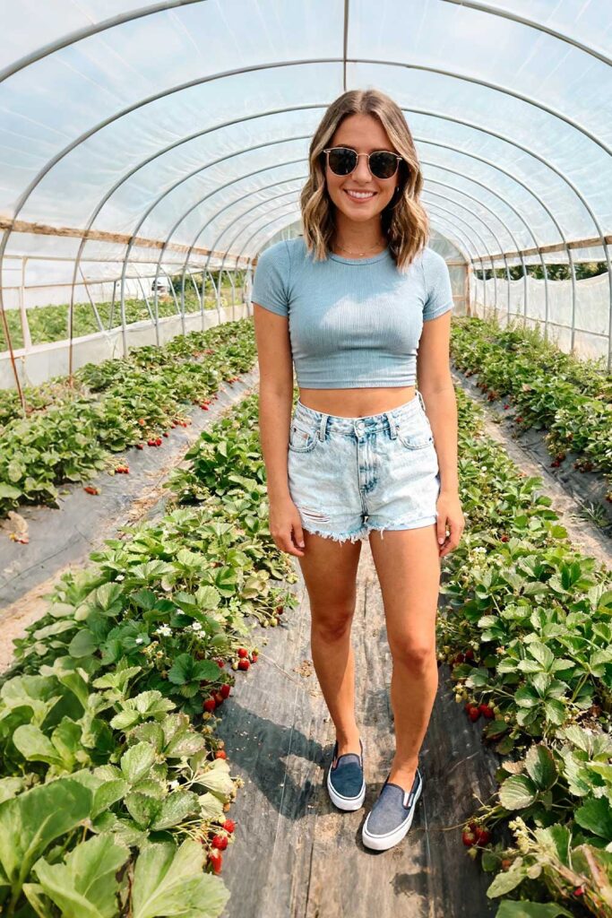 Light-wash-denim-shortalls-+-fitted-crop-top-+-slip-on-sneakers-+-sunglasses-(best-for-warm-early-summer)