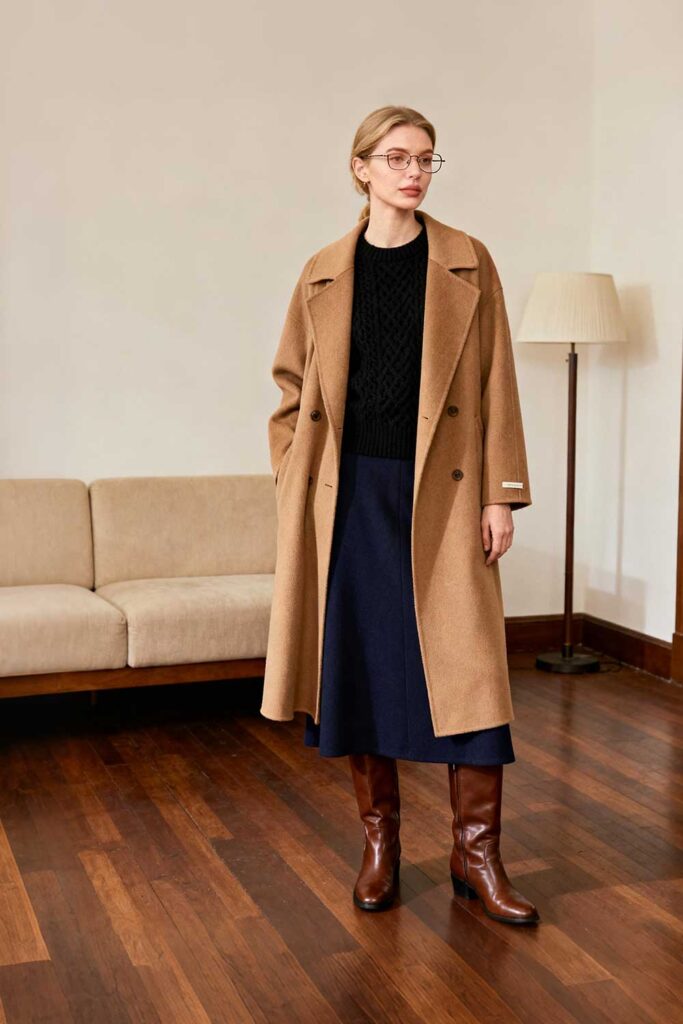 Or-try-a-camel-coat-+-black-knit-sweater-+-navy-midi-skirt-+-tall-boots-for-rich-textures-and-warm-tones-that-create-an-effortlessly-sophisticated-cold-weather-look.